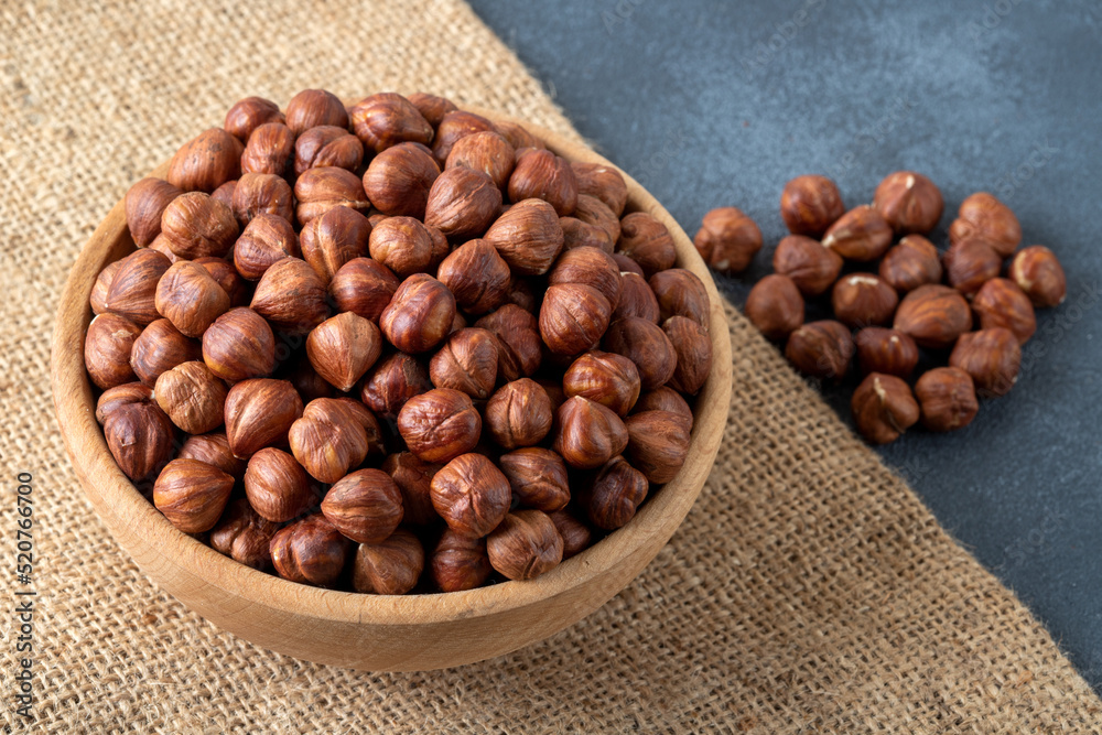 Top view of a bowl full of hazelnuts Top view of a bowl full of hazelnuts