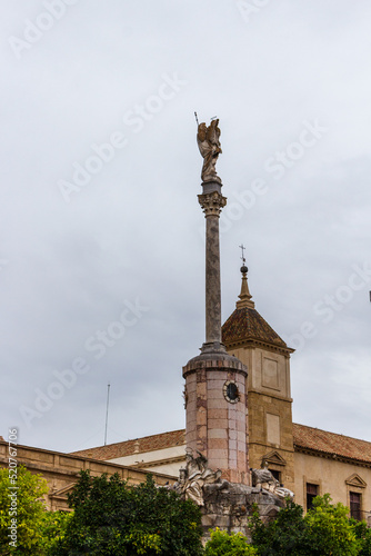 Cordoba, Spain, September 13, 2021: The Triunfo de San Rafael de la Puerta del Puente or Triumph of Saint Rafael of the Bridge Gate is a statue of San Rafael, in Cordoba, Andalusia, in Spain.