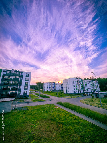 Juicy beautiful sky in the rays of the setting sun