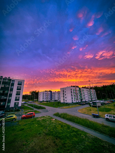 Juicy beautiful sky in the rays of the setting sun