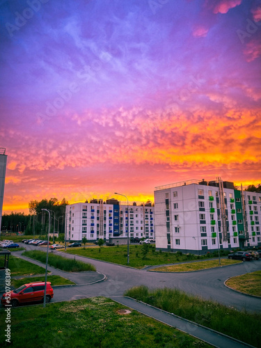 Juicy beautiful sky in the rays of the setting sun