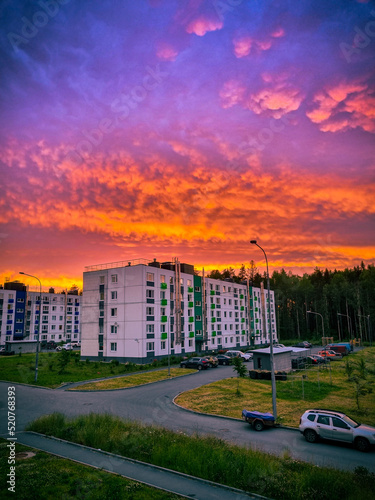 Juicy beautiful sky in the rays of the setting sun