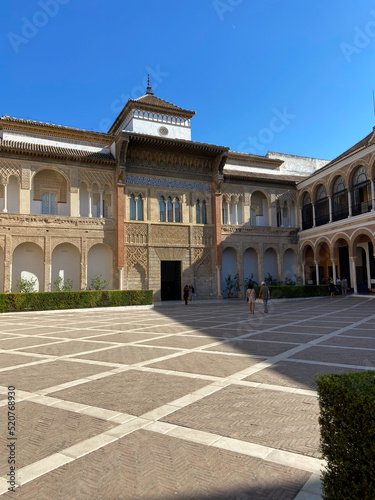 Sevilla, Spain, September 11, 2021: The Royal Palace of Seville (Real Alcazar). Mudejar Palace of Pedro I in the Hunting Courtyard (Patio de la Monteria).