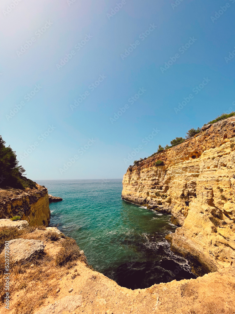 Cliffs along the coast in the Algarve Portugal. High quality photo