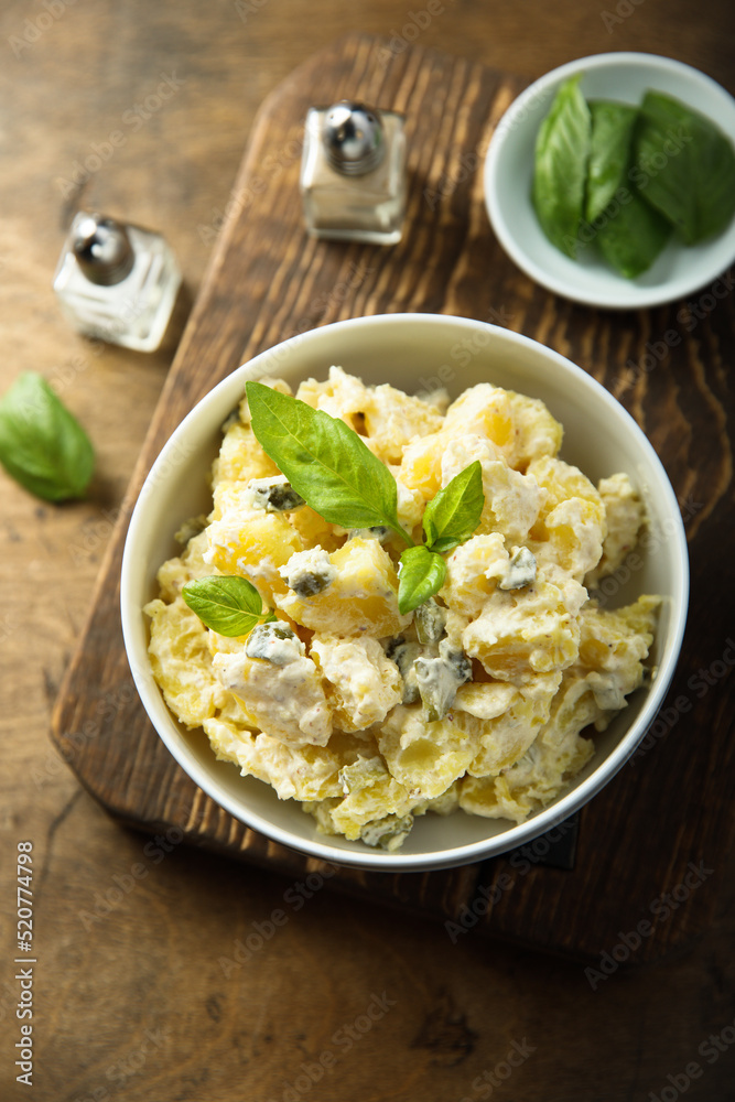 Traditional homemade potato salad with gherkins Traditional homemade potato salad with gherkins