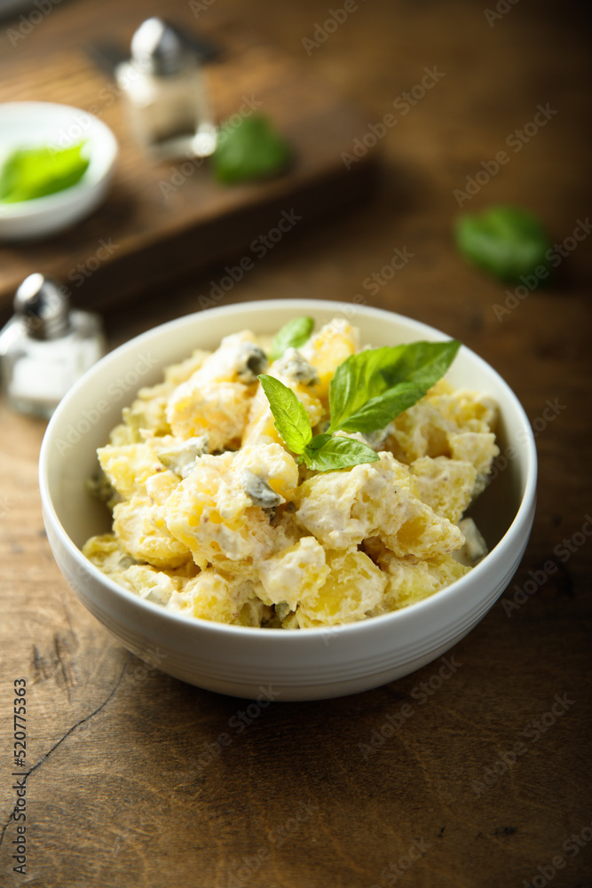 Traditional homemade potato salad with gherkins Traditional homemade potato salad with gherkins
