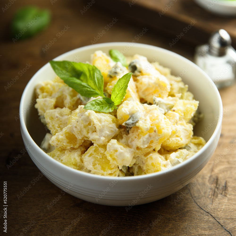 Traditional homemade potato salad with gherkins Traditional homemade potato salad with gherkins