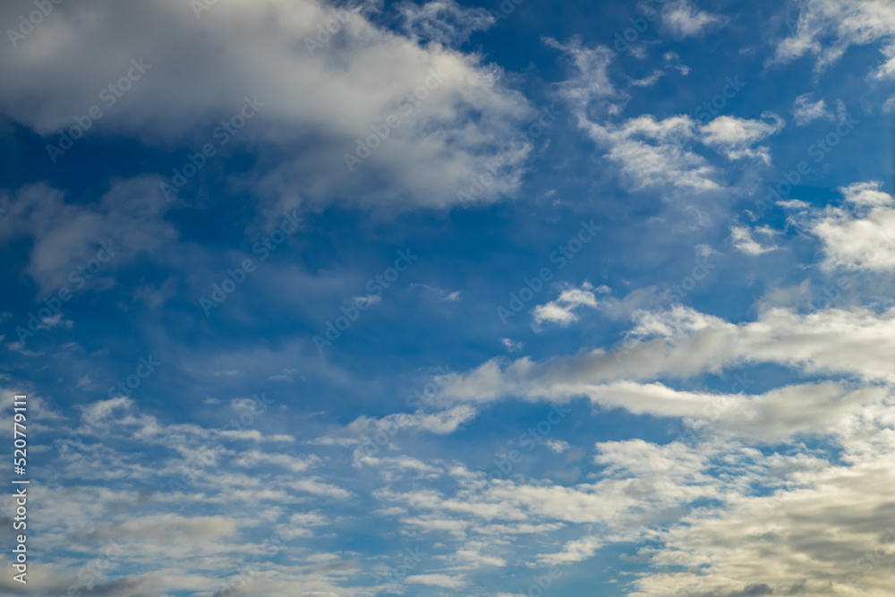 Beautiful nature background. Blue sky with white clouds.