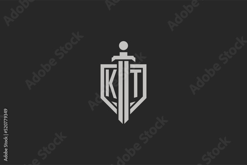 Letter KT logo with shield and sword icon design in geometric style photo