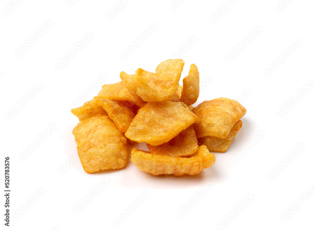 Bacon chips pile isolated, puff crisps, puffs with spices, crunchy rice puffed snacks, salty bacon chips, wheat striped krupuk or kerupuk Bacon chips pile isolated, puff crisps, puffs with spices, crunchy rice puffed snacks, salty bacon chips, wheat striped krupuk or kerupuk