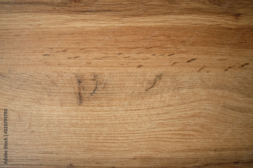 Wooden background texture. Light brown surface of old knotty wood with a natural color Wooden background texture. Light brown surface of old knotty wood with a natural color