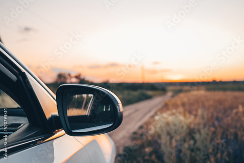 Tourism car on highway with sunset landscape