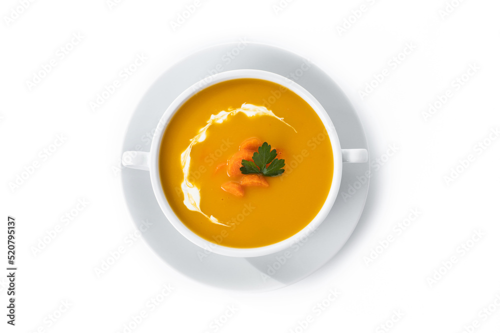 Carrot soup with cream and parsley isolated on white background Carrot soup with cream and parsley isolated on white background