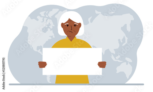 The concept of world attention. A woman holds a white poster in his hands against the background of a world map.