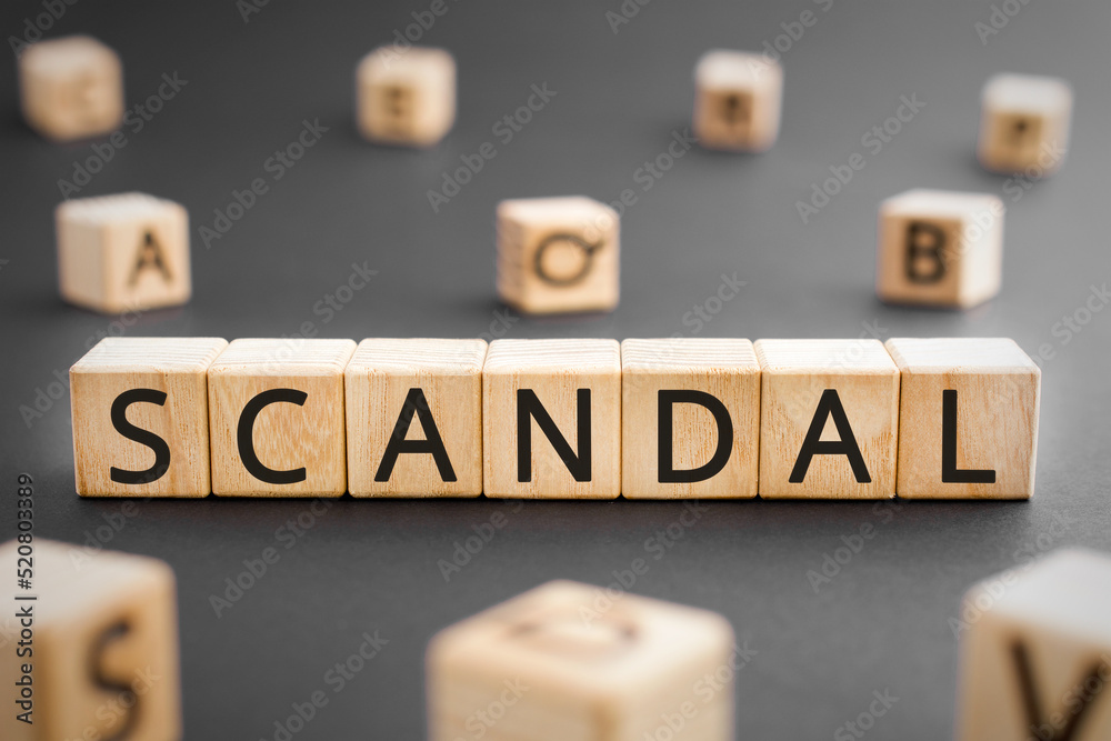Scandal word from wooden blocks with letters, Scandal scene, fracas