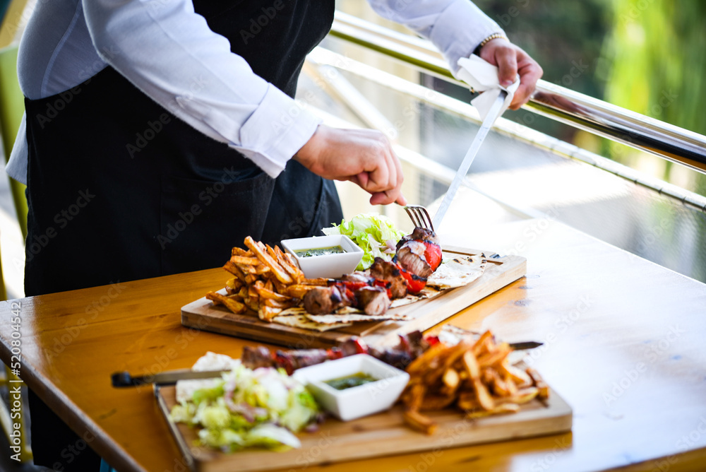 tasty greek souvlaki skier with fresh vegetables