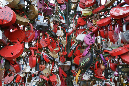 Russia. Moscow. The locks of the newlyweds attached to the fence.