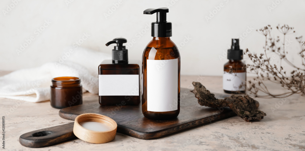 Bottles with natural shampoo on light background Bottles with natural shampoo on light background