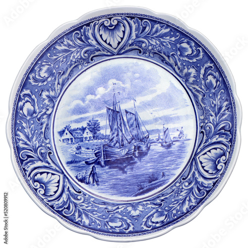Old Blue and white ceramic plate with Dutch motifs as a souvenir