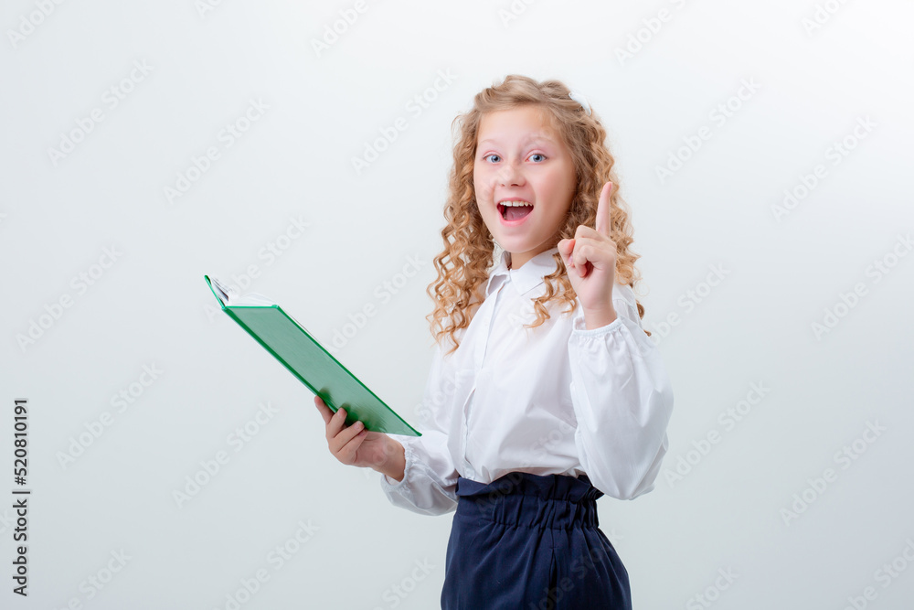 schoolgirl teenage girl in school uniform holding a book on a white background schoolgirl teenage girl in school uniform holding a book on a white background