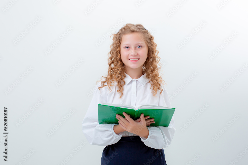 schoolgirl teenage girl in school uniform holding a book on a white background schoolgirl teenage girl in school uniform holding a book on a white background