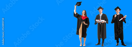 Graduating students on blue...