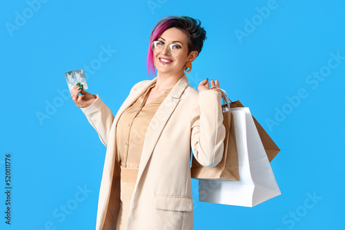 Beautiful woman with credit...