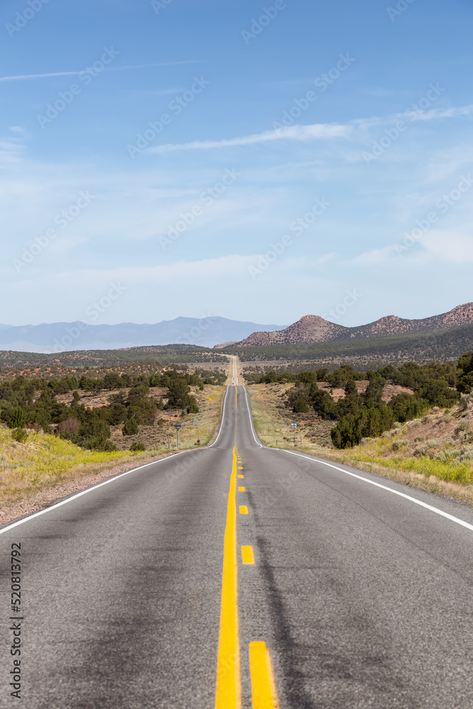 Scenic Highway Route in the Desert with American Mountain Landscape. Sunny Morning. Utah, United States of America. Scenic Highway Route in the Desert with American Mountain Landscape. Sunny Morning. Utah, United States of America.