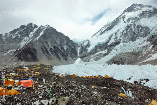 khumbu icefall glacier mount everest base camp orange tents mountain climbing nepal base camp trek