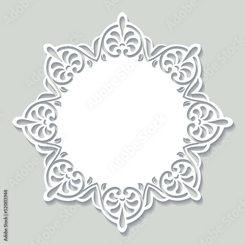 Vintage round lacy ornamental frame. Paper cut design.