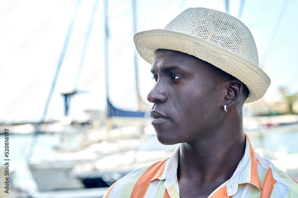 Black man on embankment Black man on embankment