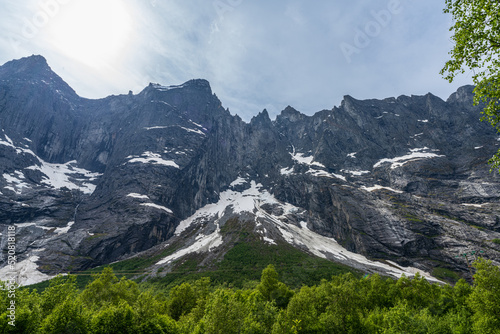 The Troll Wall (English) or Trollveggen (Norwegian),a part of the mountain massif Trolltindene (Troll Peaks) in the Romsdalen valley, Norway photo