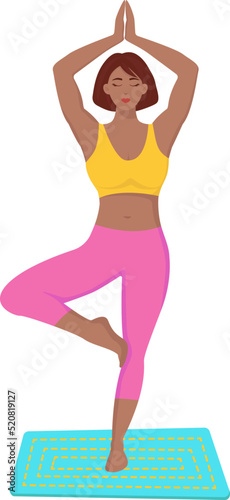 A girl does yoga standing on one leg. A young girl does yoga and stays in the "vrikshasana" (tree pose) pose for beginners.