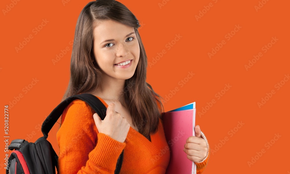 Funny teen student girl posing. Education in high school university college concept. Funny teen student girl posing. Education in high school university college concept.