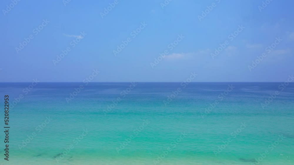 Professional video 4K Low angle view landscape beach sand seascape background in good weather day Tropical weather Locations Andaman sea Phuket Thailand. Nature and Go Everywhere travel concept. Professional video 4K Low angle view landscape beach sand seascape background in good weather day Tropical weather Locations Andaman sea Phuket Thailand. Nature and Go Everywhere travel concept.