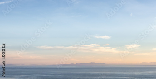 Panoramic View of Cloudscape during a colorful sunset or sunrise. Taken on the West Coast of British Columbia  Canada.