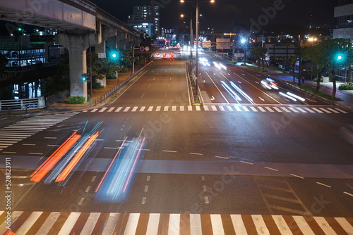Slow shutter speed car lights, City scape of Naha in Okinawa, japan - 日本 沖縄 那覇の街並み 夜 道路  © Eric Akashi