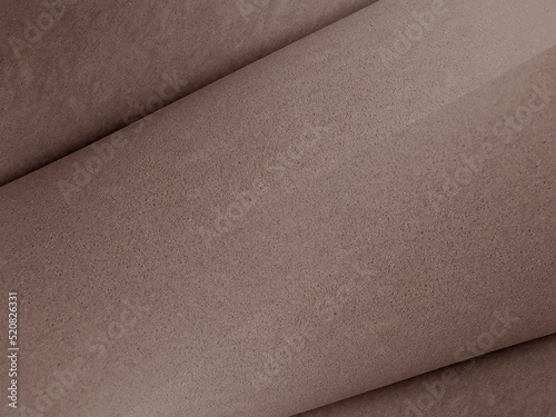 brown sponge foam textured background with striped, diagonal and wavy surface