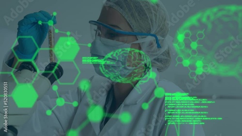 Animation of digital brain, molecules and data processing over caucasian scientist in lab photo