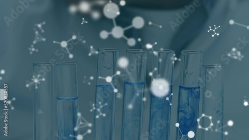 Animation of molecules over caucasian scientist in lab photo