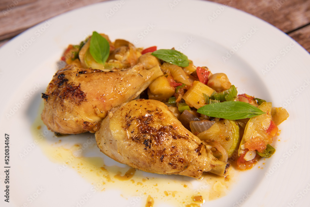 Recipe for grilled basquaise chicken with vegetables in ratatouille. High quality photo