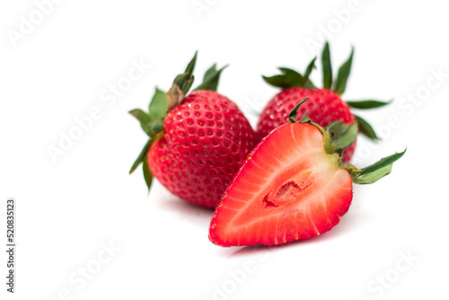 Strawberry isolated. Strawberries isolate. Strawberries with leaf isolate. Whole and half of strawberry on white. Side view strawberries set.