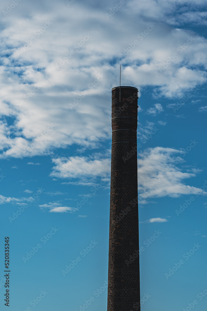 Chimney of a factory. in the town of Gjøvik, Norway.