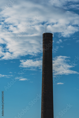 Chimney of a factory. in the town of Gjøvik, Norway. photo