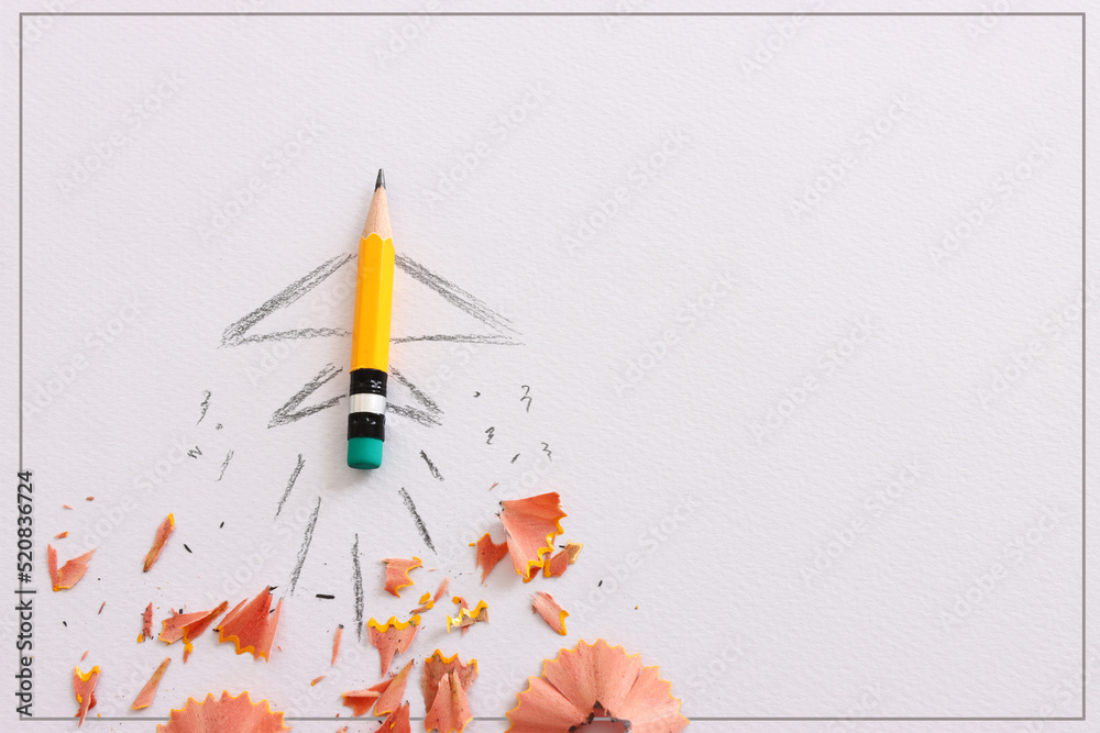 Pencil and rocket sketch over textured paper, concept of back to school, creativity and success Pencil and rocket sketch over textured paper, concept of back to school, creativity and success