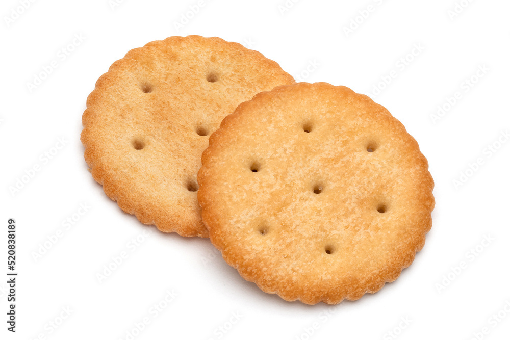 Healthy whole wheat cracker on white background. Stack of Saltine crackers isolated on white background. Round crackers. Healthy whole wheat cracker on white background. Stack of Saltine crackers isolated on white background. Round crackers.