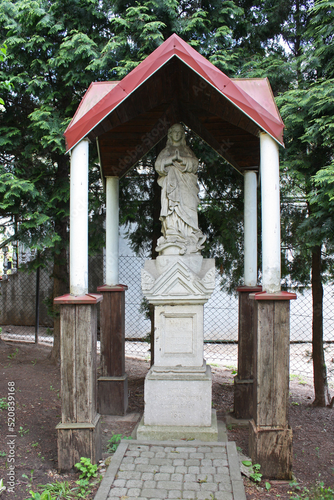 Sculpture Oud Lady near Church of the Nativity of the Blessed Virgin Mary in Sambir, Lviv Oblast, Ukraine Sculpture Oud Lady near Church of the Nativity of the Blessed Virgin Mary in Sambir, Lviv Oblast, Ukraine
