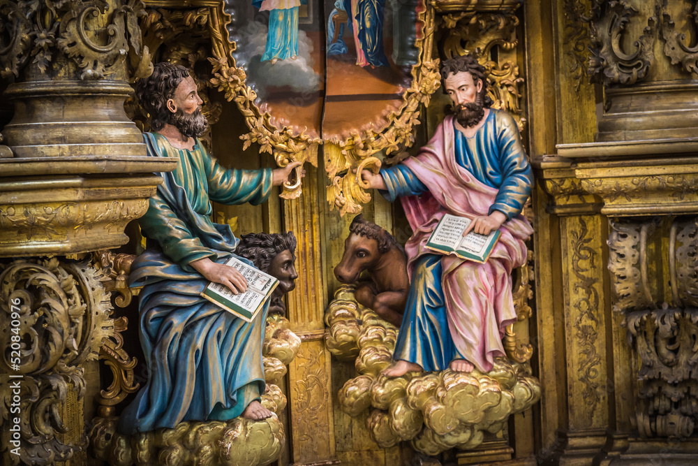 Fototapeta premium Russia Vologda Oblast Morozovitsa 07 21 2017 The fragment of 18th century wooden baroque iconostasis in the orthodox Troitse-Gledensky Monastery in the village of Morozovitsa near Veliky Ustyug