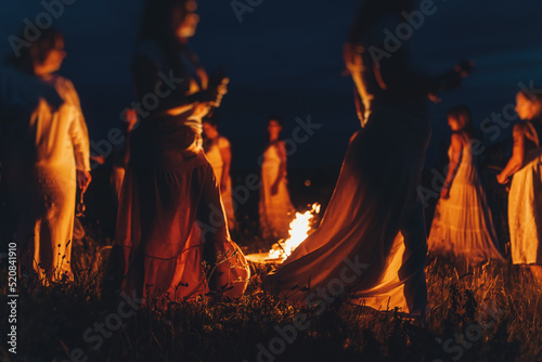 Women at the night ceremony. Ceremony space.
