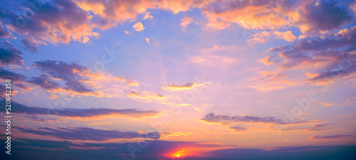 Fantastic pink sunset against bright sky © Serghei V